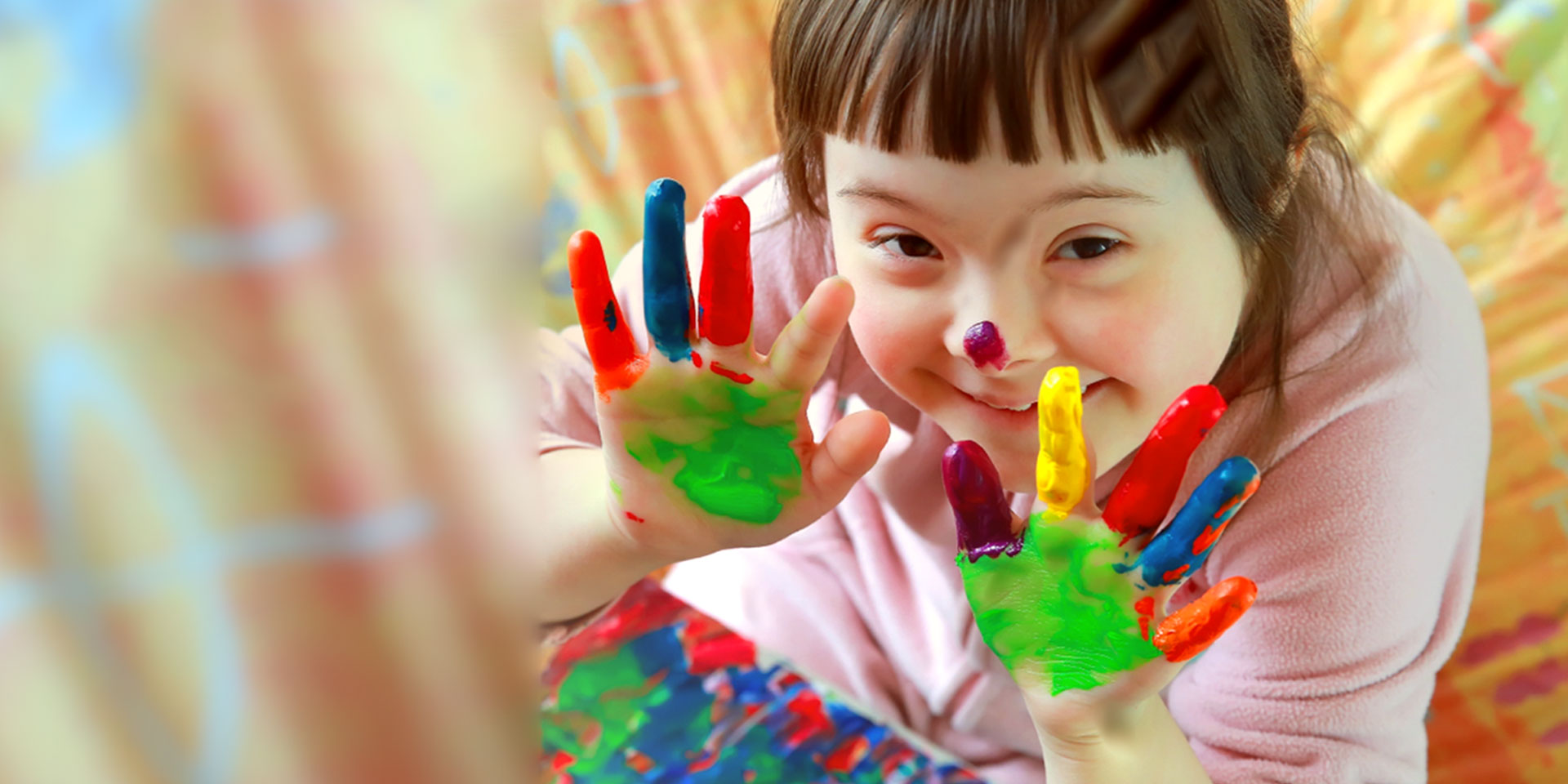 Child with paint on their hands